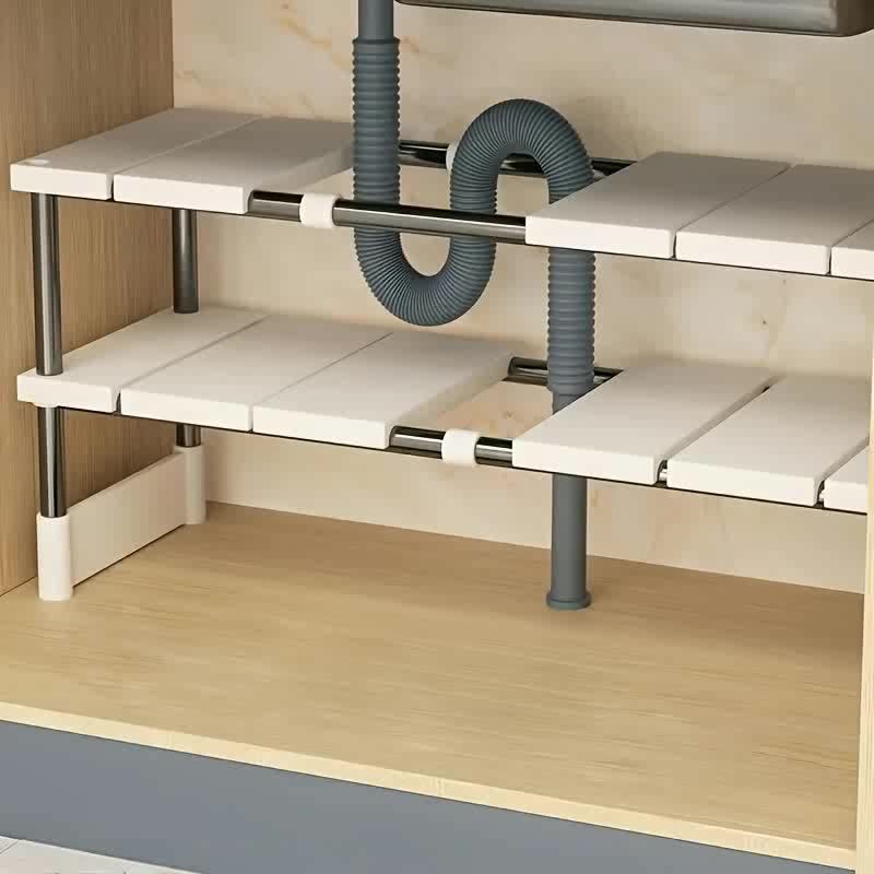 Kitchen Gadgets Cabinet - ชั้นวางของใต้ซิงค์แบบปรับได้ - ชั้นวางของประหยัดพื้นที่หลายชั้นทำจากสแตนเลส เหมาะสำหรับตู้ครัวและตู้ห้องน้ำ ดีไซน์ไร้ไม้ ทนทาน